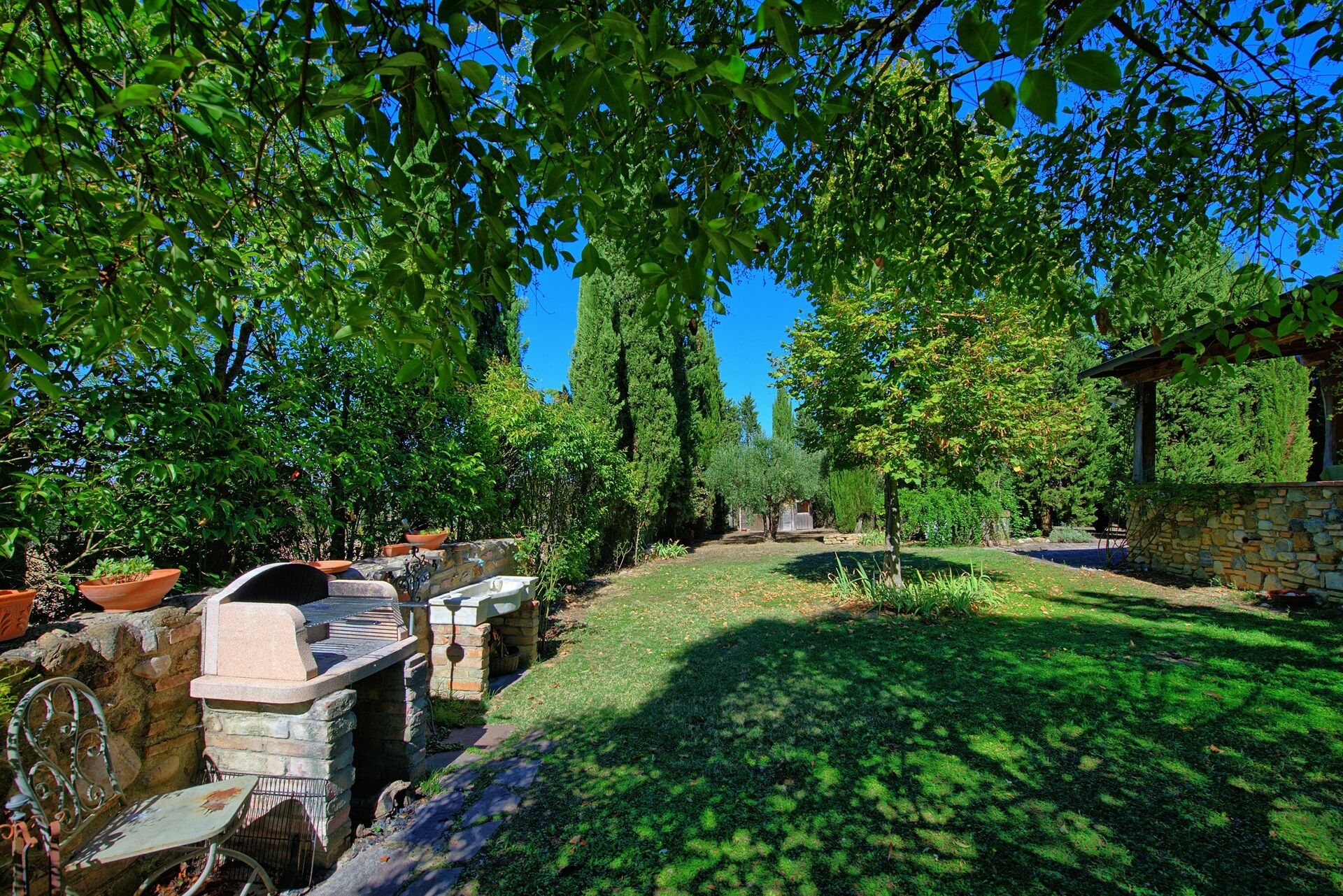 Casa Cipressi tuin in Sciano